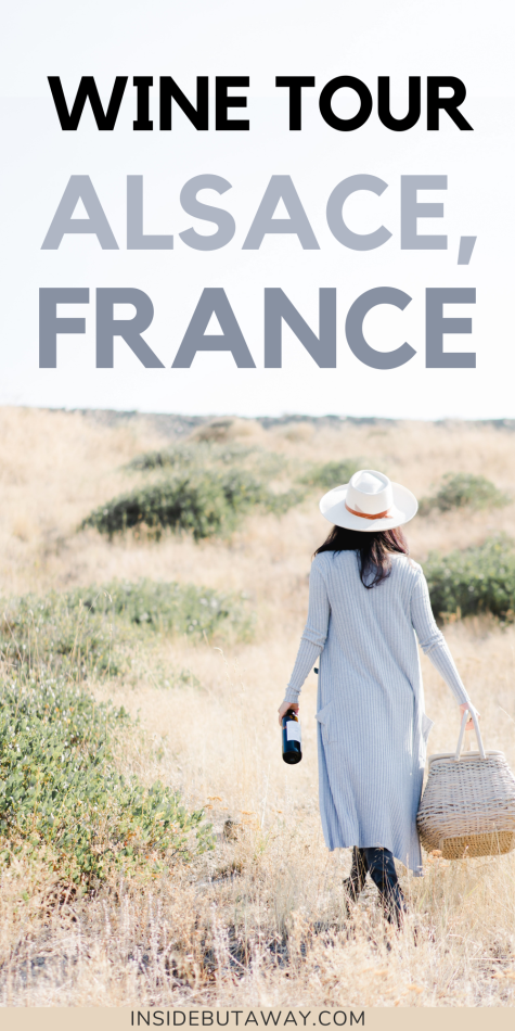 woman walking through a winery in france